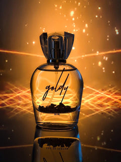 GOLDY perfume bottle reflecting light, ideal for perfume shopping, fragrance enthusiasts, gifts for her, and special occasions.