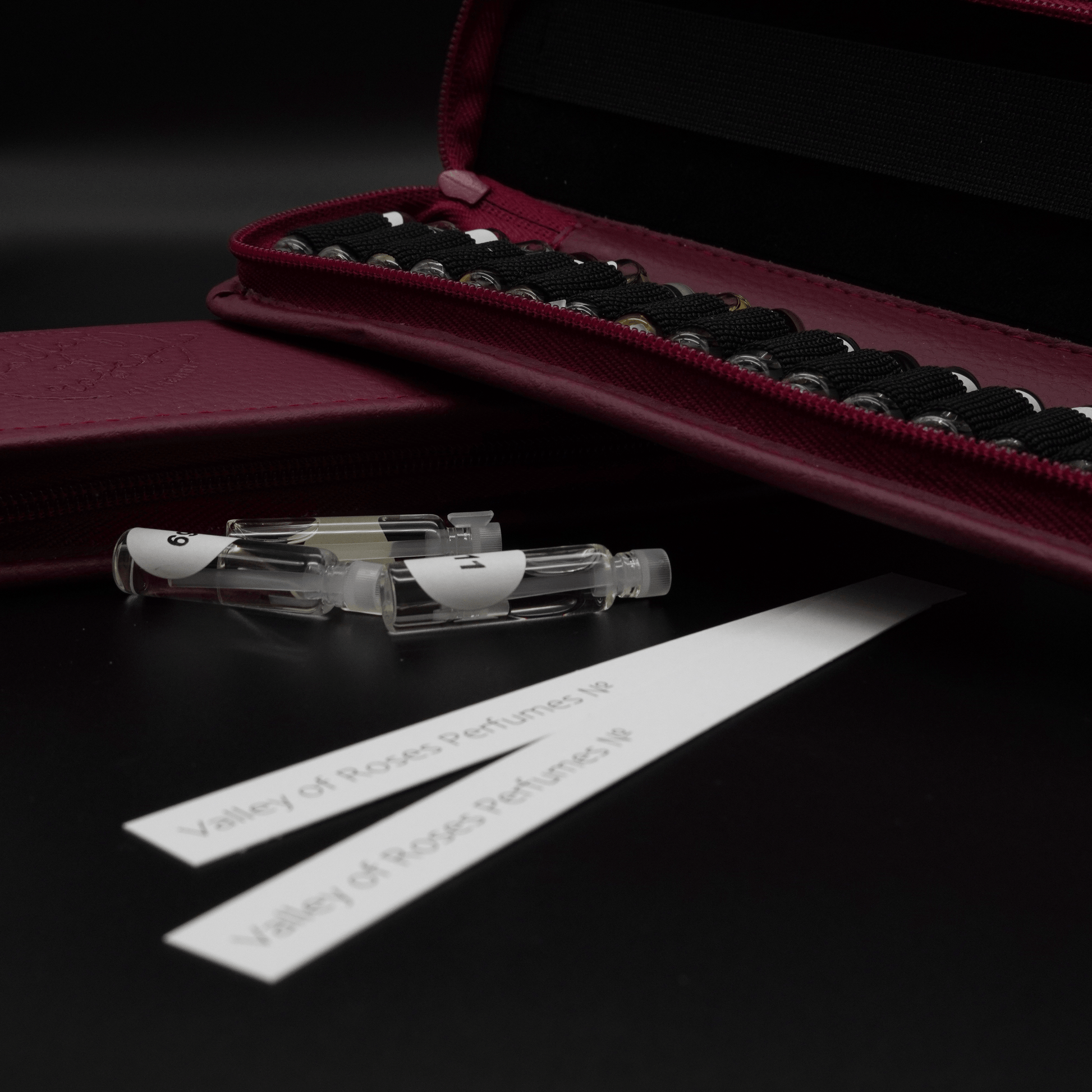 Discovery Kit Folder with Valley of Roses mini perfume samples and a custom vegan leather case.