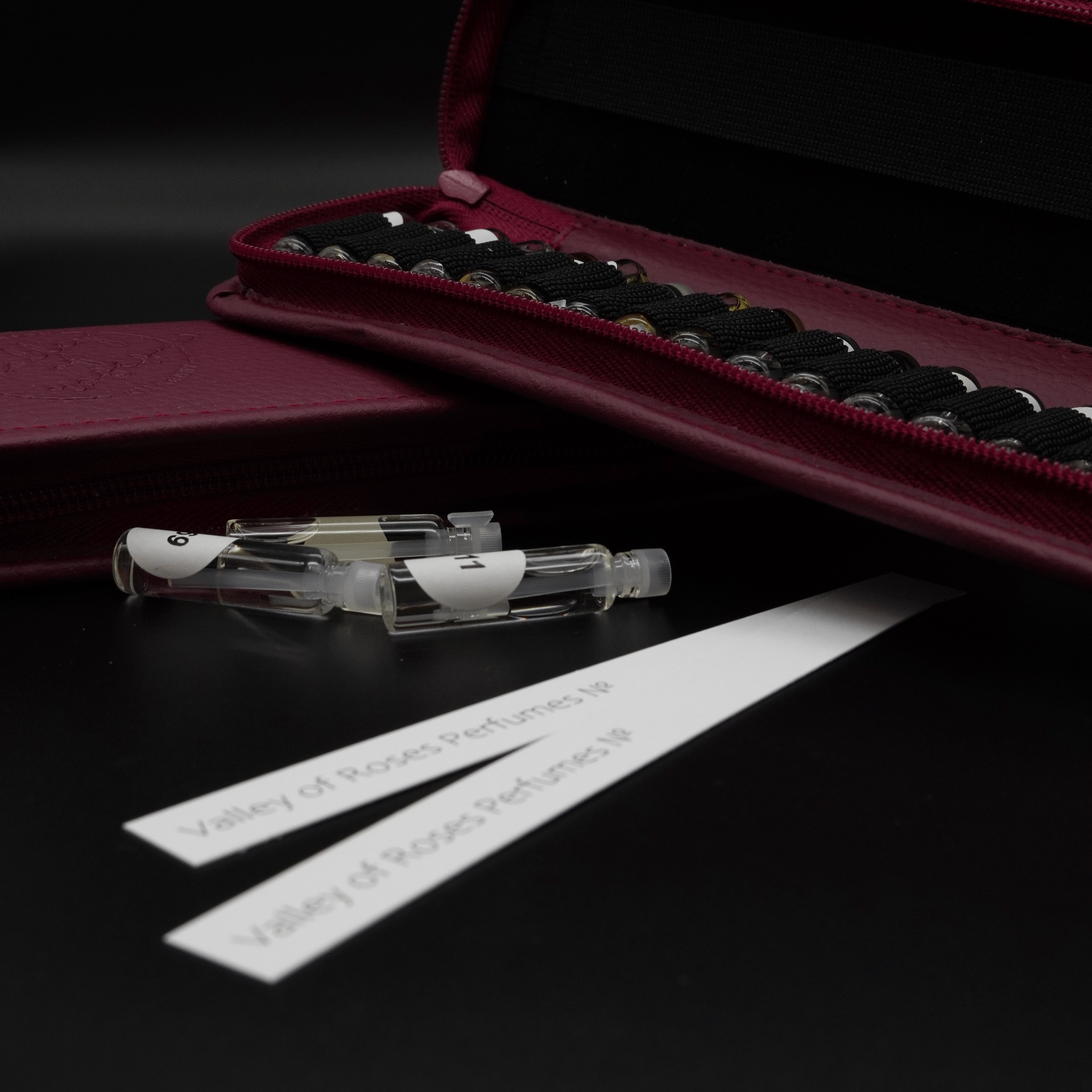 Discovery Kit Folder with Valley of Roses mini perfume samples and a custom vegan leather case.