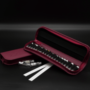 Discovery Kit Folder with 40 fragrances, vegan leather case, perfume samples, perfect gift for fragrance lovers.